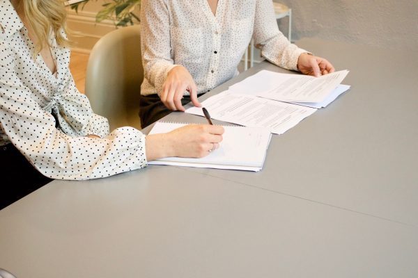 Signing home buying legal documents